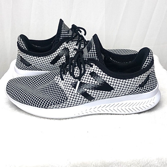New Balance Shoes - New Balance black and white athletic shoes Women size 8